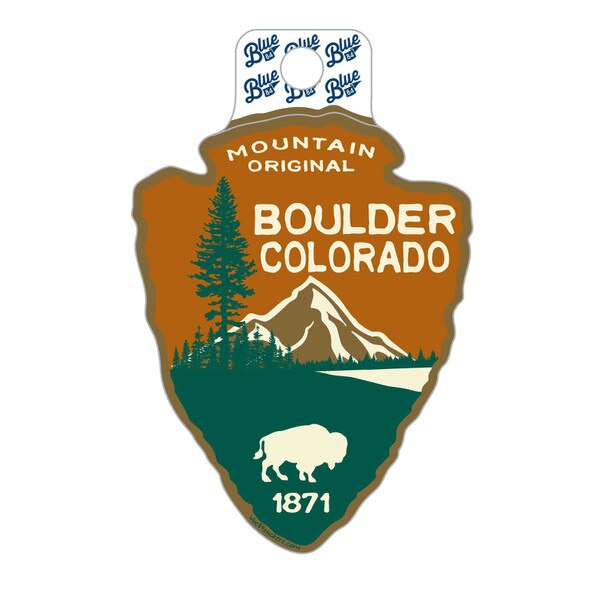 An orange and green arrowhead shaped sticker with a mountain scenery with a little buffalo, it reads "Mountain Original", "Boulder Colorado", and 1871 in white lettering.